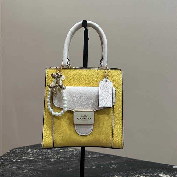 Coach Handbags - Coach Mini Bag in Yellow and White